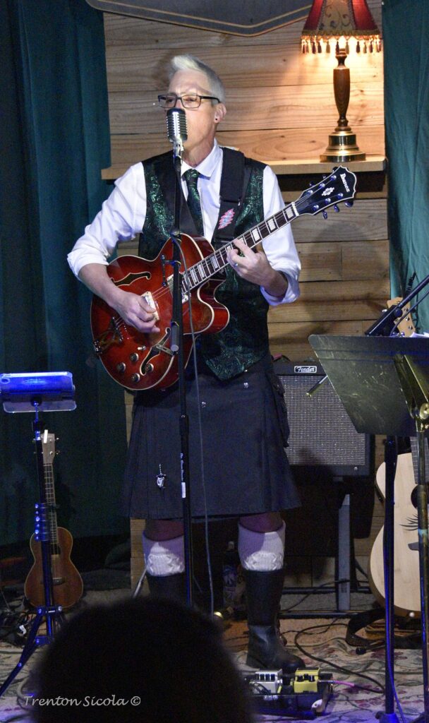 Matt Donald in his kilt playing guitar at Waller's on St. Patrick's Day