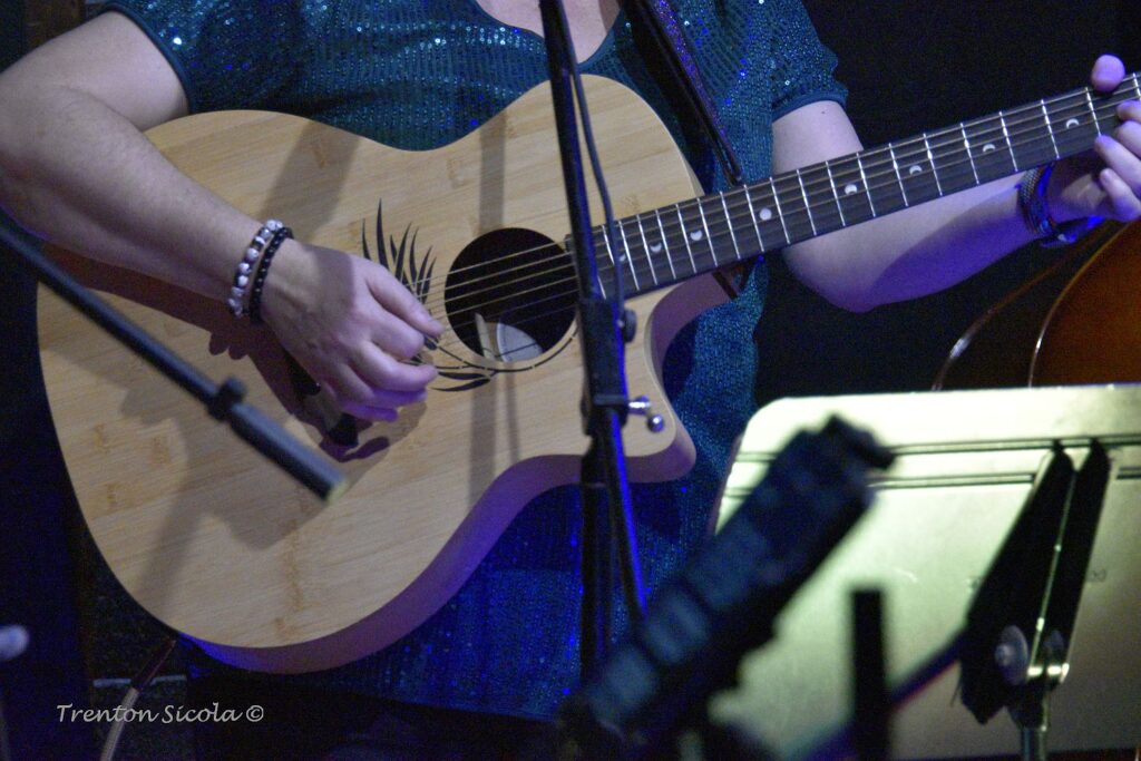 Hand strumming guitar